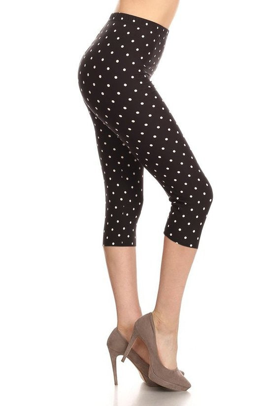 High Waisted Capri Leggings With An Elastic Band In A White Polka Dot Print Over A Black Background Look Up Deals